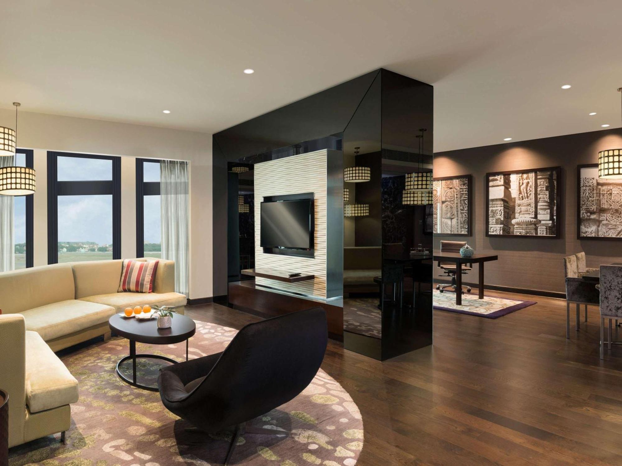 풀만 뉴델리 인터네셔널 에어포트- 아코르 럭셔리 브랜드 호텔 외부 사진 A typical apartment interior