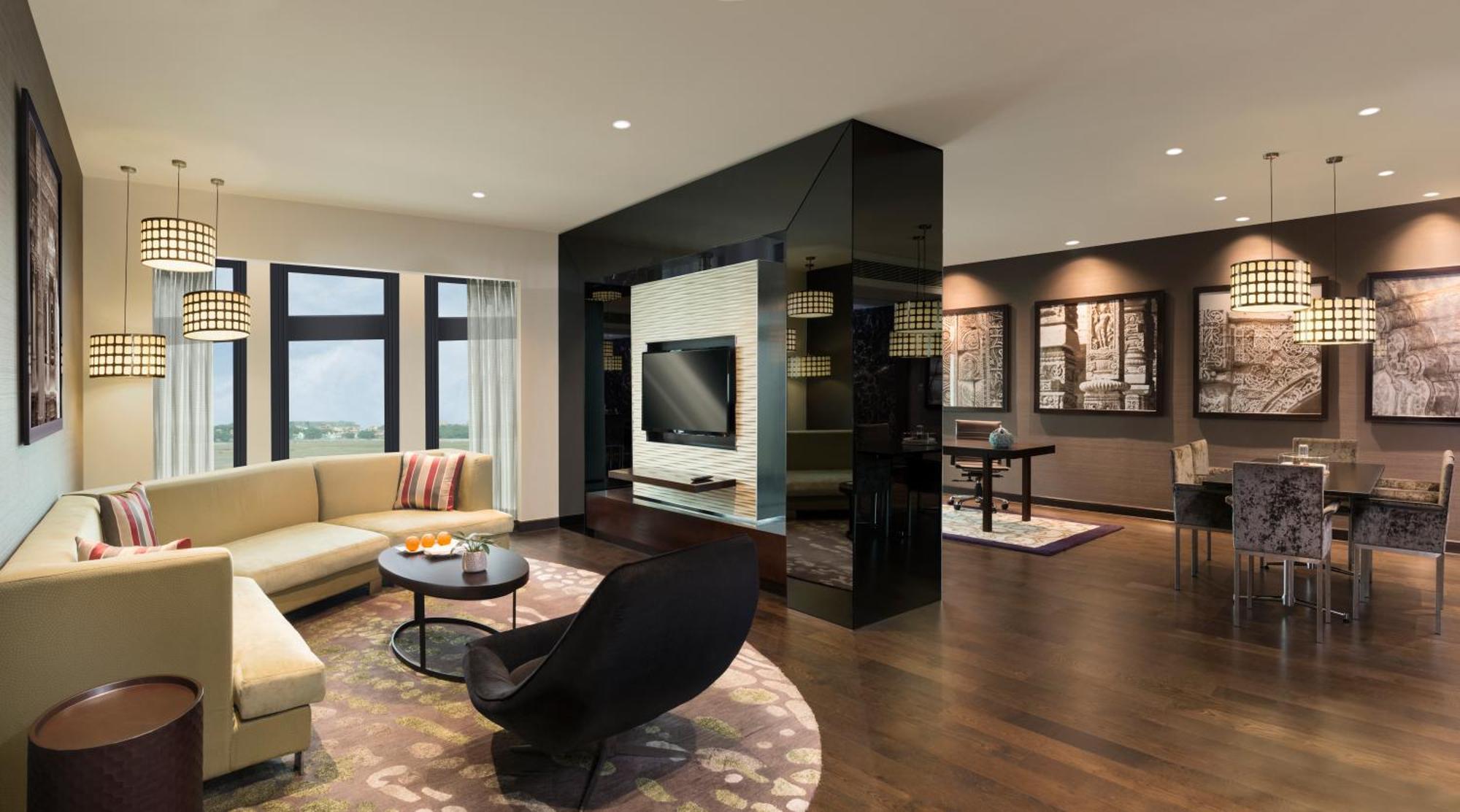 풀만 뉴델리 인터네셔널 에어포트- 아코르 럭셔리 브랜드 호텔 외부 사진 A typical apartment interior
